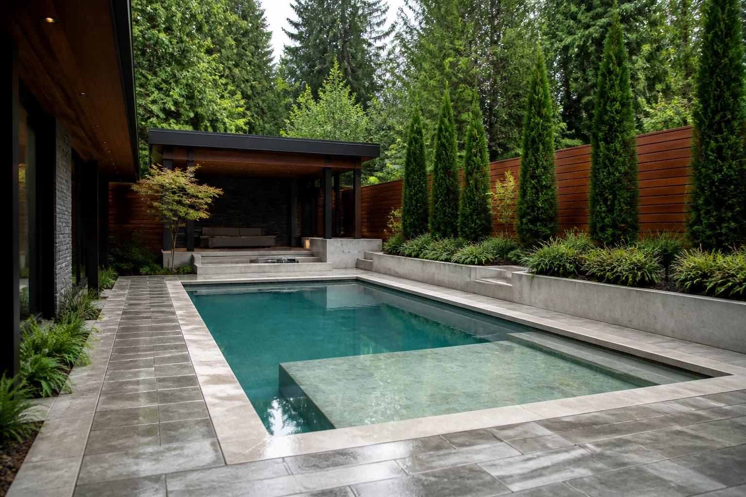 Architectural courtyard pool concept surrounded by cedar and greenery